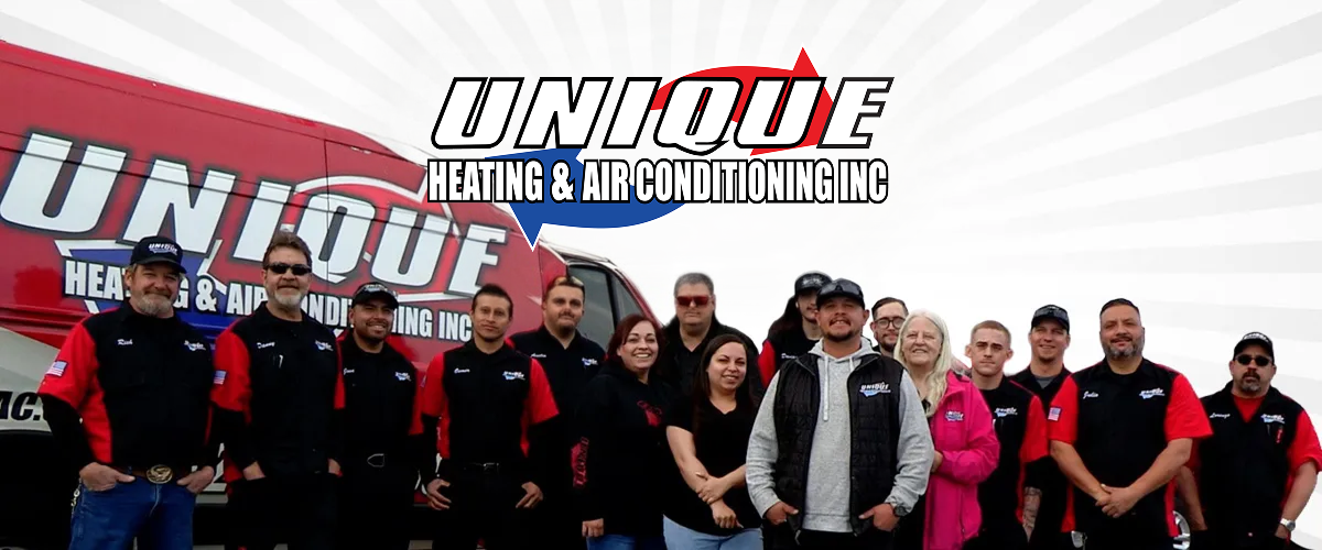 unique heating & air conditioning team photo with van and logo